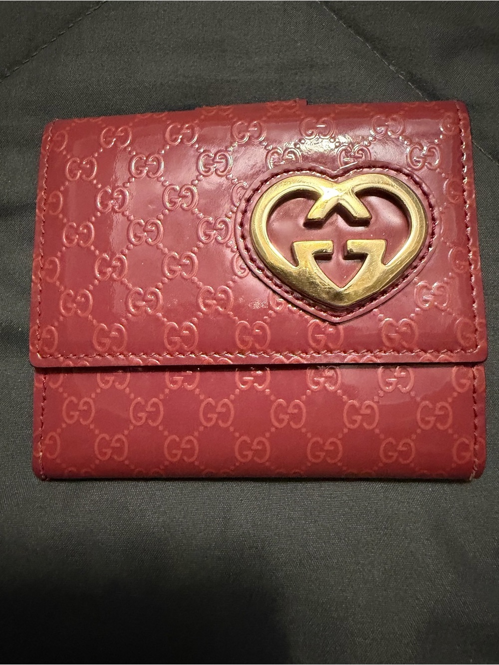 Gucci Embossed GG Red Leather Wallet with Gold Heart Emblem
